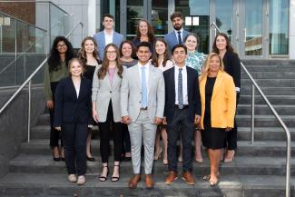 the MHA Fall 2021 Cohort of students posing on steps. Back Row: Jason Moore, Jessica Ahlgrim, Ali Ahmad Middle Row: Tharunika Venkatesan, Hannah Wethington, Holly Powers, Kate Cox, Shelby Watkins, Megan Gilmore Front Row: Becca Rawlings, Kaitlyn Shell, Shivang Patel, Corbin Kirksey, Tisha Clayborn