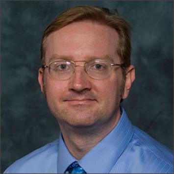 a profile photograph of Richard Charnigo