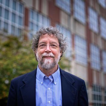 a profile photograph of John S. Lyons