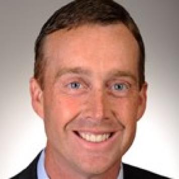 a profile photograph of Scott Watkins