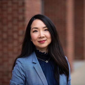 a profile photograph of Maggie Lang